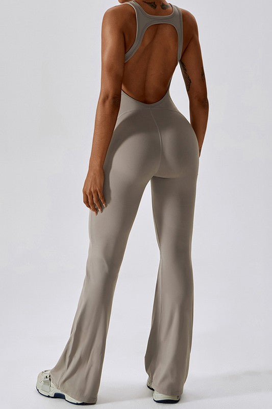 Fitted Sleeveless Jumpsuit with Flared Trousers and a Cutout Back Trendy Activewear Outfit Idea for Women | Ro + Ivy