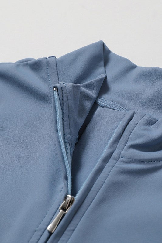 Zippered Short Sleeve Activewear Jumpsuit Trendy Activewear Outfit Idea for Women | Ro + Ivy