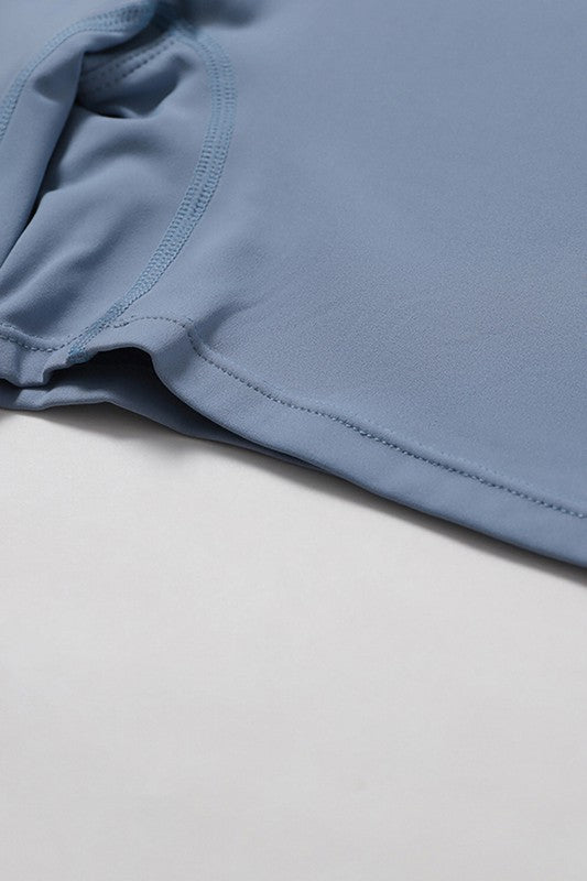 Zippered Short Sleeve Activewear Jumpsuit Trendy Activewear Outfit Idea for Women | Ro + Ivy