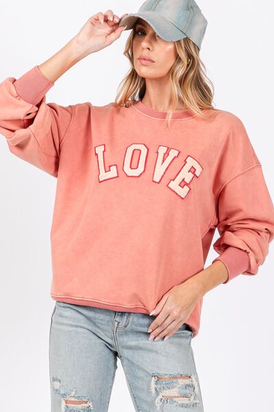 Pink Orange LOVE Path Applique Drop Shoulder Sweatshirt in Pink Orange Trendy Sweatshirts Outfit Idea for Women | Ro + Ivy