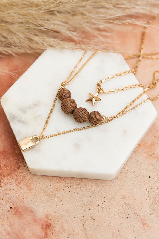 Three Layered Rustic Gold Charmed Necklace | Trendy Necklaces Outfit Idea for Women by Ro + Ivy | Elevated Basics, Modern Comfort & Style