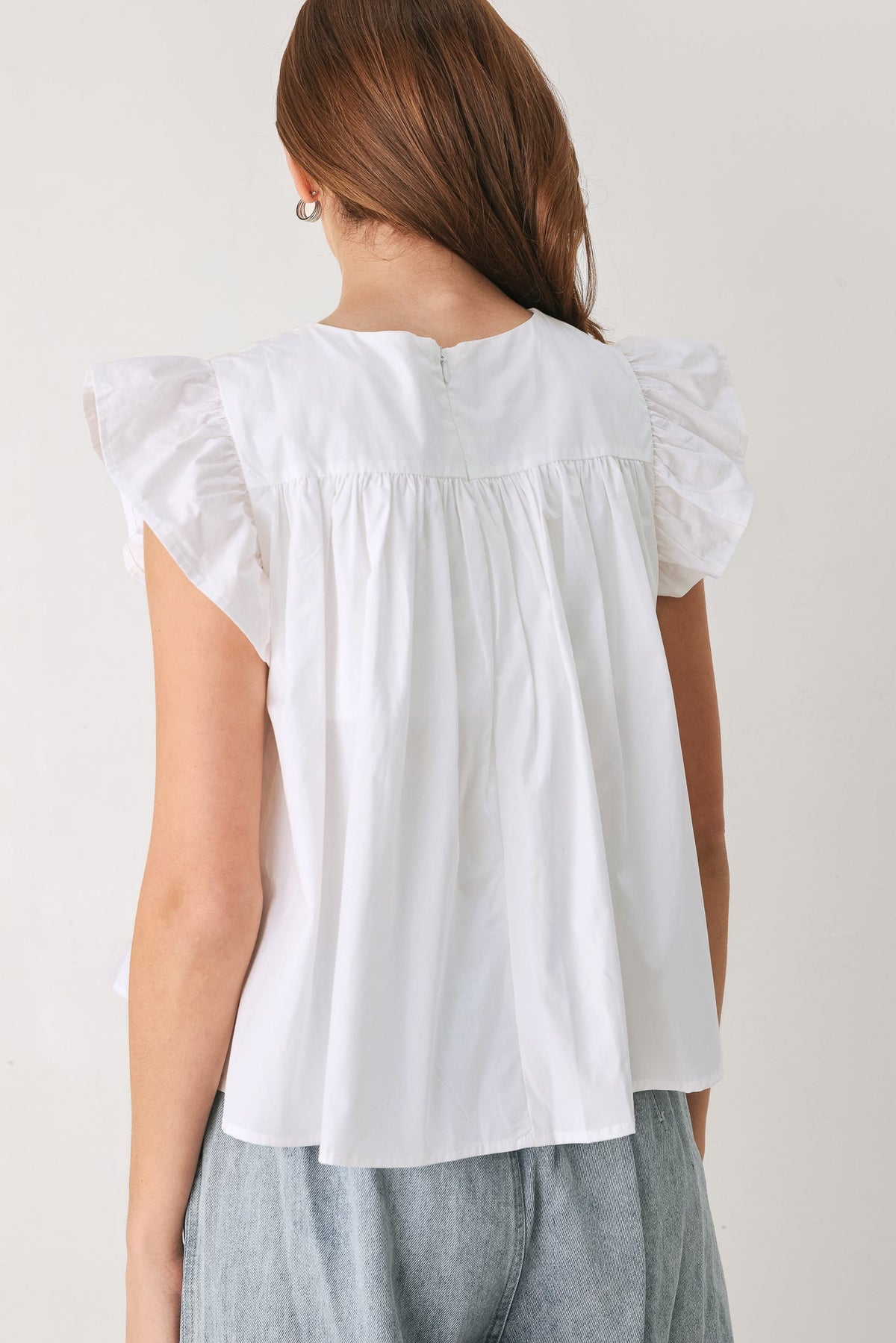 White Woven Sleeveless Top with Structured Silhouette