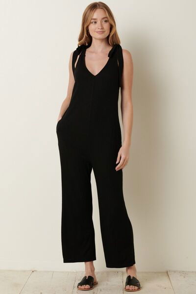 Black Rib Knit V-Neck Cross Back Jumpsuit for Women Trendy Jumpsuits Outfit Idea for Women | Ro + Ivy