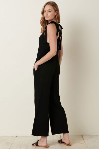 Rib Knit V-Neck Cross Back Jumpsuit for Women Trendy Jumpsuits Outfit Idea for Women | Ro + Ivy