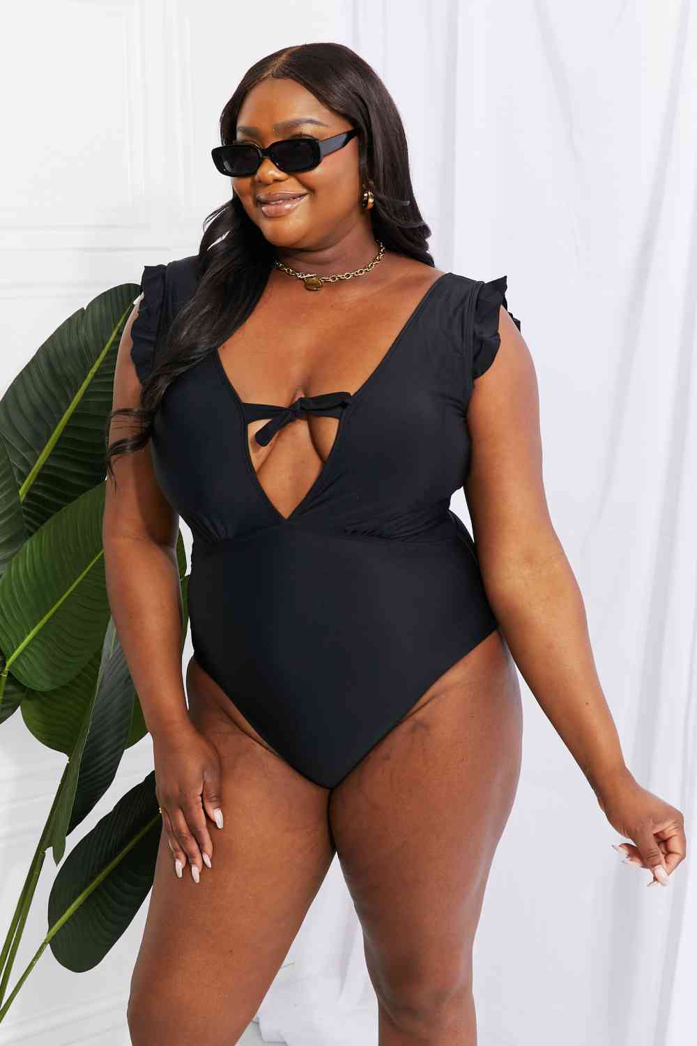 Swim Seashell Ruffle Sleeve One-Piece in Black for Women | Swimsuits | Ro + Ivy