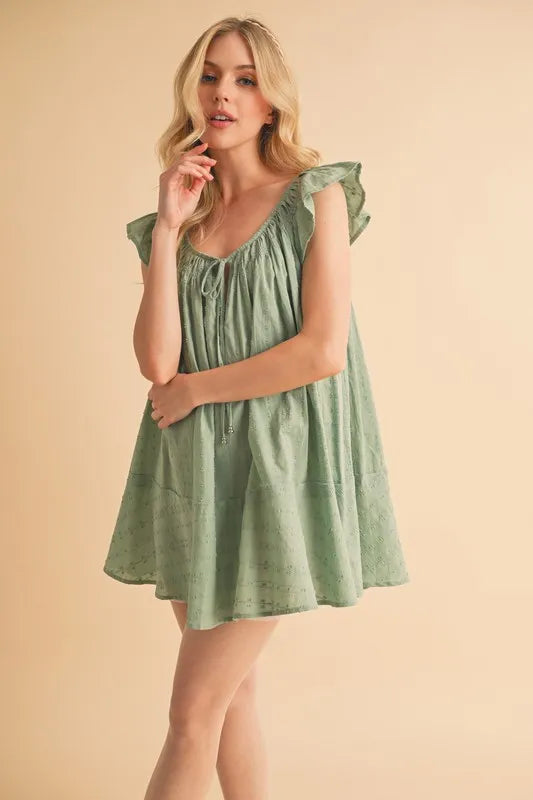Ruffled Cap Sleeve Cotton Tunic Mini Dress in Green – outfit idea for women | Ro + Ivy