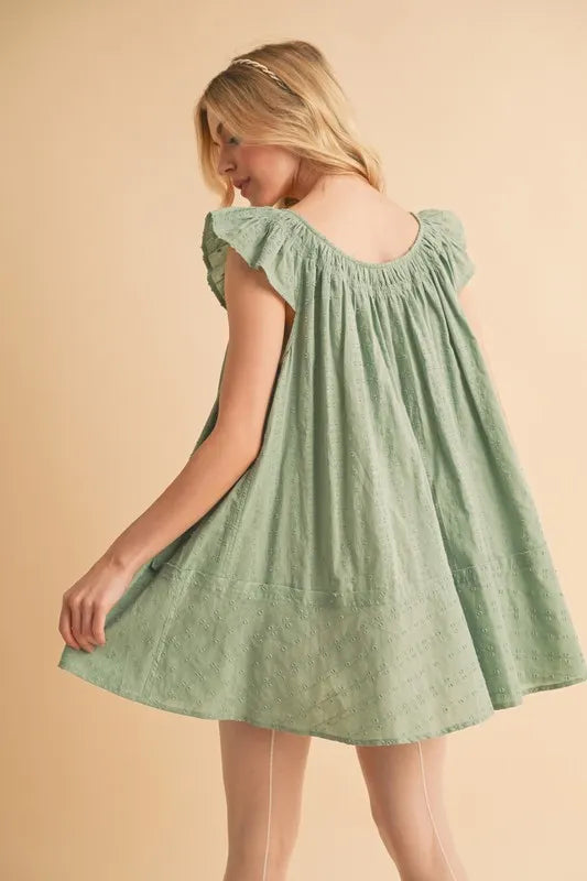 Ruffled Cap Sleeve Cotton Tunic Mini Dress in Green – outfit idea for women | Ro + Ivy
