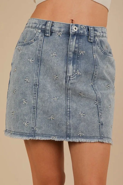 Bow Printed Casual Denim Mini Skirt in Indigo – outfit idea for women | Ro + Ivy