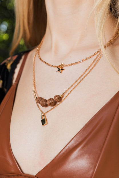 Three Layered Rustic Gold Charmed Necklace | Trendy Necklaces Outfit Idea for Women by Ro + Ivy | Elevated Basics, Modern Comfort & Style