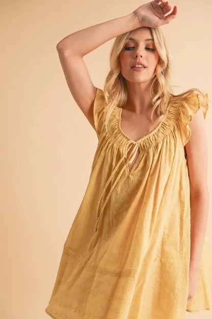Ruffled Cap Sleeve Cotton Tunic Mini Dress – outfit idea for women | Ro + Ivy