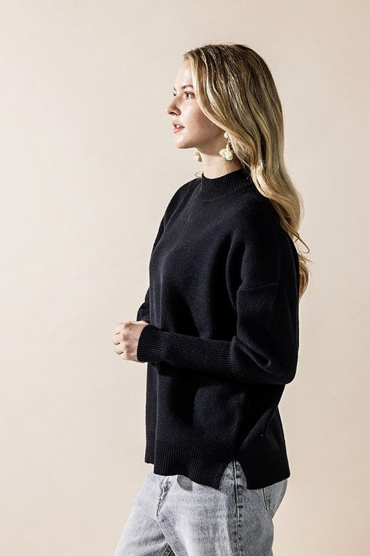 Black Plus Mock Neck Balloon Sleeve Side Slit Sweater | Trendy Sweaters Outfit Idea for Women by Ro + Ivy | Elevated Basics, Modern Comfort & Style