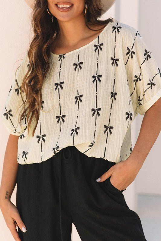 Bow Print Puff Short Sleeve Top – White outfit idea for women | Ro + Ivy