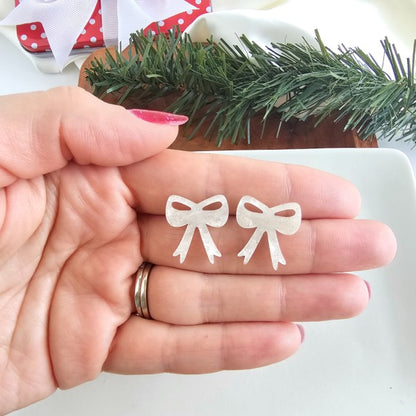 White Christmas Bow Stud Earrings | Trendy Earrings Outfit Idea for Women by Ro + Ivy | Elevated Basics, Modern Comfort & Style