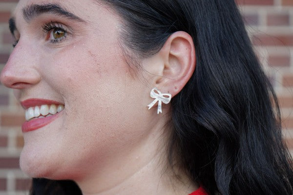 White Christmas Bow Stud Earrings | Trendy Earrings Outfit Idea for Women by Ro + Ivy | Elevated Basics, Modern Comfort & Style