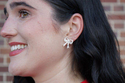 White Christmas Bow Stud Earrings | Trendy Earrings Outfit Idea for Women by Ro + Ivy | Elevated Basics, Modern Comfort & Style