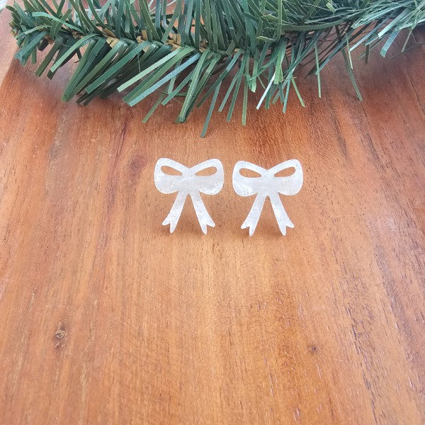 White Christmas Bow Stud Earrings | Trendy Earrings Outfit Idea for Women by Ro + Ivy | Elevated Basics, Modern Comfort & Style