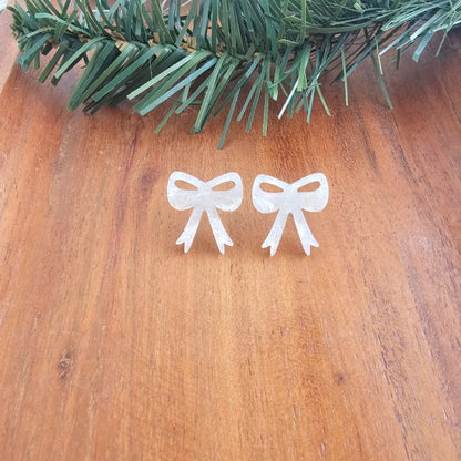 White Christmas Bow Stud Earrings | Trendy Earrings Outfit Idea for Women by Ro + Ivy | Elevated Basics, Modern Comfort & Style