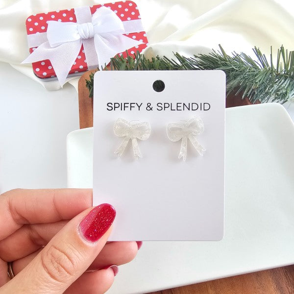White Christmas Bow Stud Earrings | Trendy Earrings Outfit Idea for Women by Ro + Ivy | Elevated Basics, Modern Comfort & Style