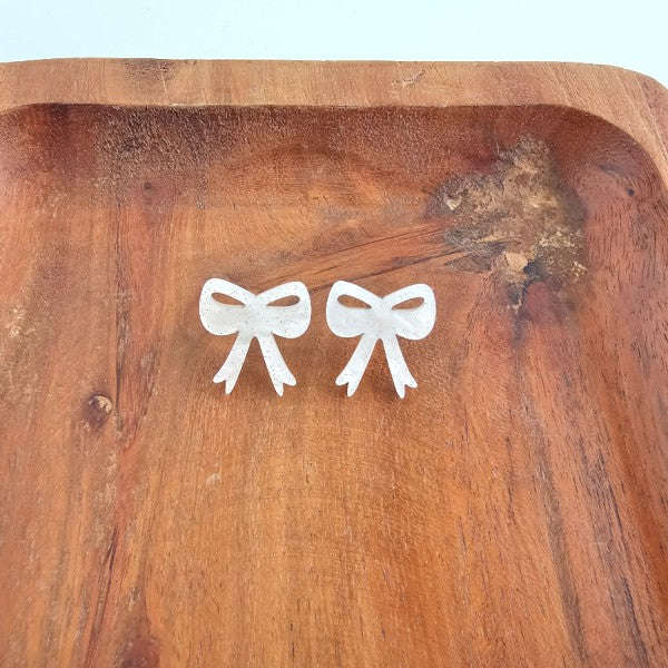 White Christmas Bow Stud Earrings | Trendy Earrings Outfit Idea for Women by Ro + Ivy | Elevated Basics, Modern Comfort & Style