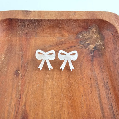 White Christmas Bow Stud Earrings | Trendy Earrings Outfit Idea for Women by Ro + Ivy | Elevated Basics, Modern Comfort & Style