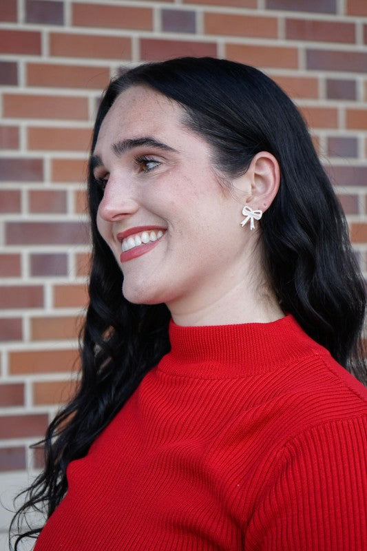 White Christmas Bow Stud Earrings | Trendy Earrings Outfit Idea for Women by Ro + Ivy | Elevated Basics, Modern Comfort & Style