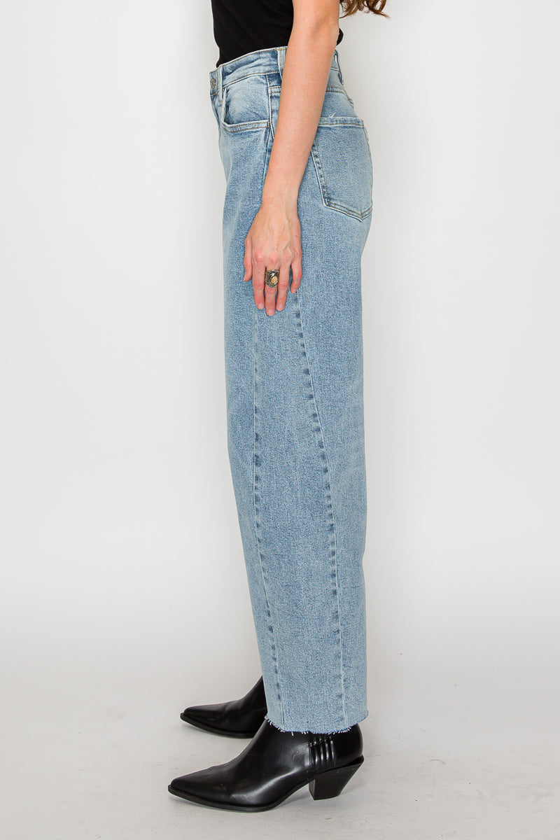 High-Waisted Barrel Leg Jeans — Light Wash Cotton Blend Raw Hem - Jeans