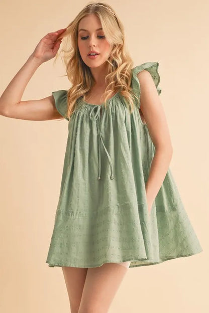 Ruffled Cap Sleeve Cotton Tunic Mini Dress in Green – PISTACHIO outfit idea for women | Ro + Ivy