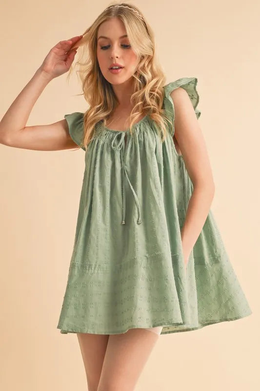 Ruffled Cap Sleeve Cotton Tunic Mini Dress in Green – PISTACHIO outfit idea for women | Ro + Ivy