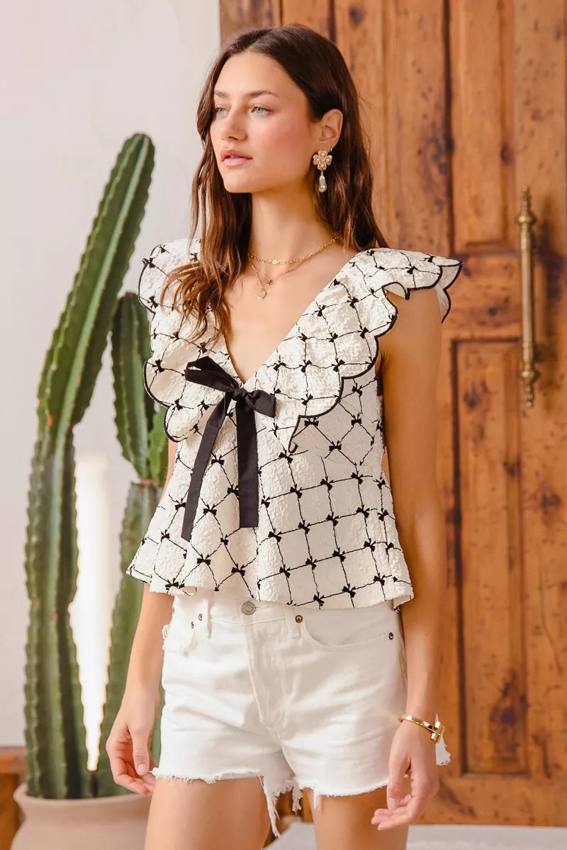 Textured V Neck Bow Tie Short Sleeve Scallop Blouse | Trendy Blouses Outfit Idea for Women by Ro + Ivy | Elevated Basics, Modern Comfort & Style