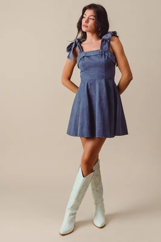 Denim Washed Fit and Flare Mini Dress with Bow Straps and Square Neck – outfit idea for women | Ro + Ivy