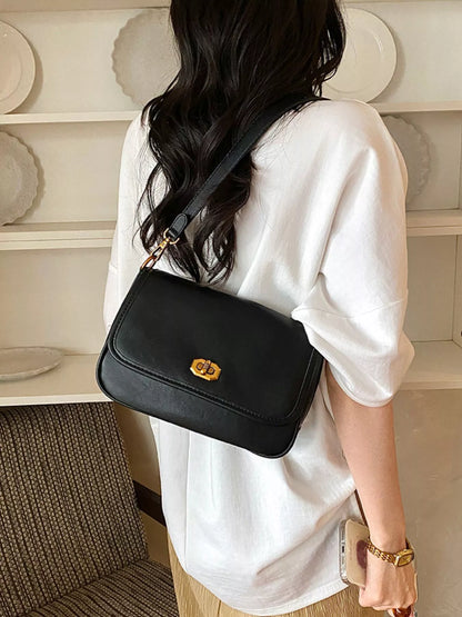 Twist Lock Shoulder Bag