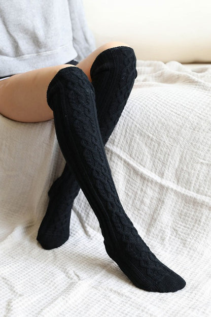 Black Default Long Knee High Cable Knit Socks Trendy Socks Outfit Idea for Women | Ro + Ivy