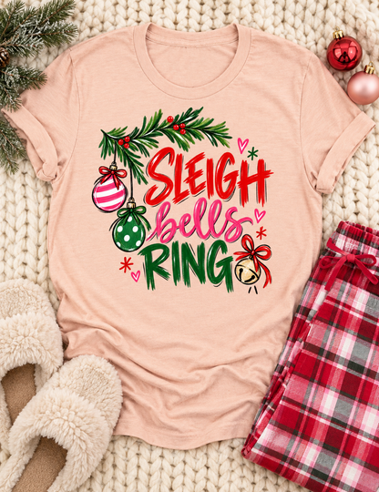 Sleigh Bells Ring Holiday Graphic Tee with Festive Lettering Heather Peach