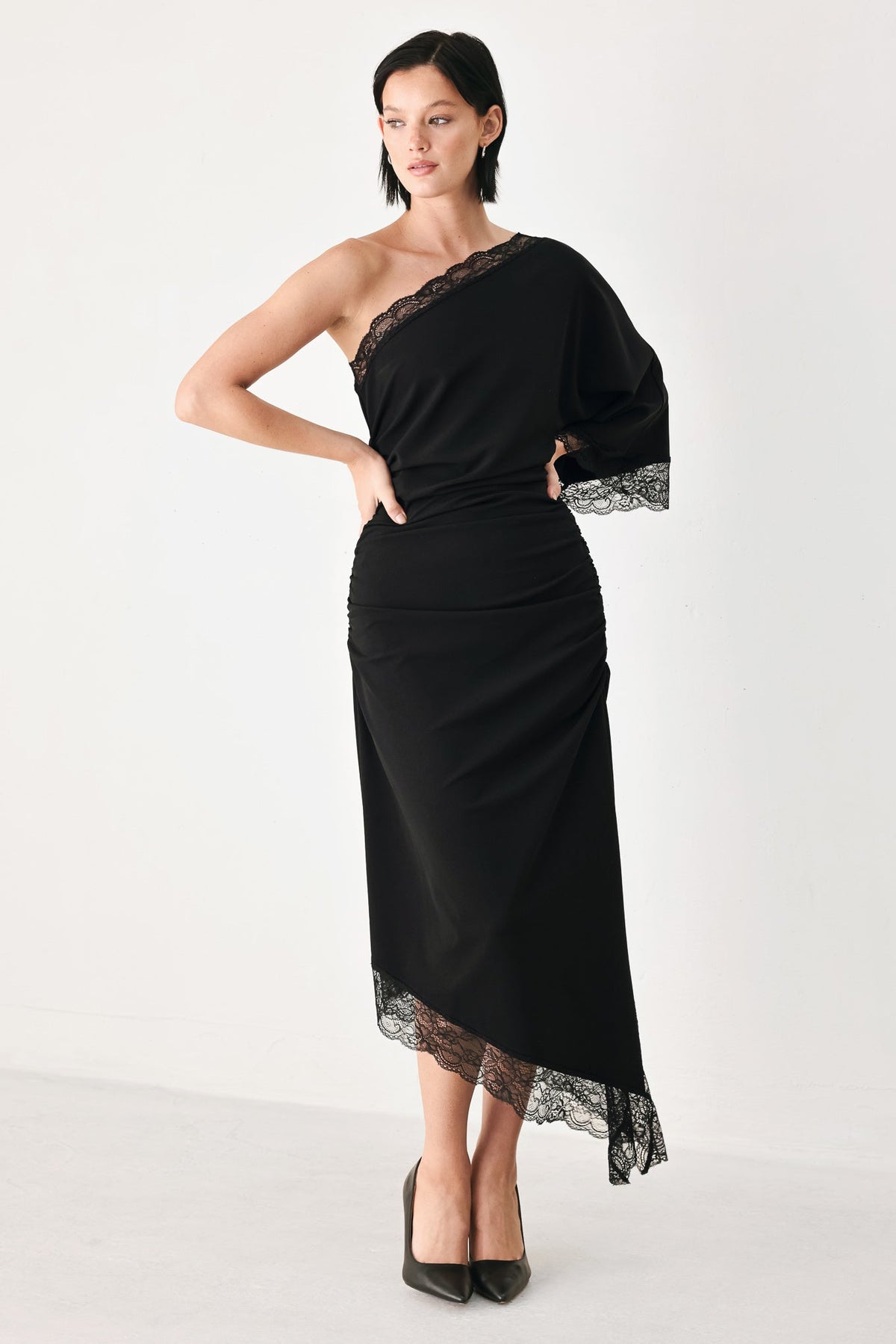 Black Knit Asymmetric Midi Dress with Ruched Bodice and Lace-Trim Hem