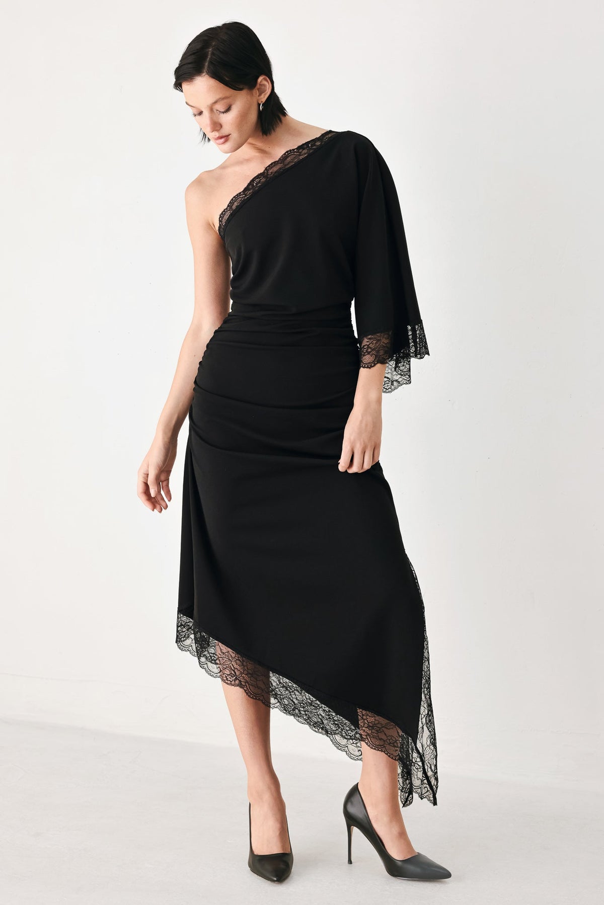 Black Knit Asymmetric Midi Dress with Ruched Bodice and Lace-Trim Hem