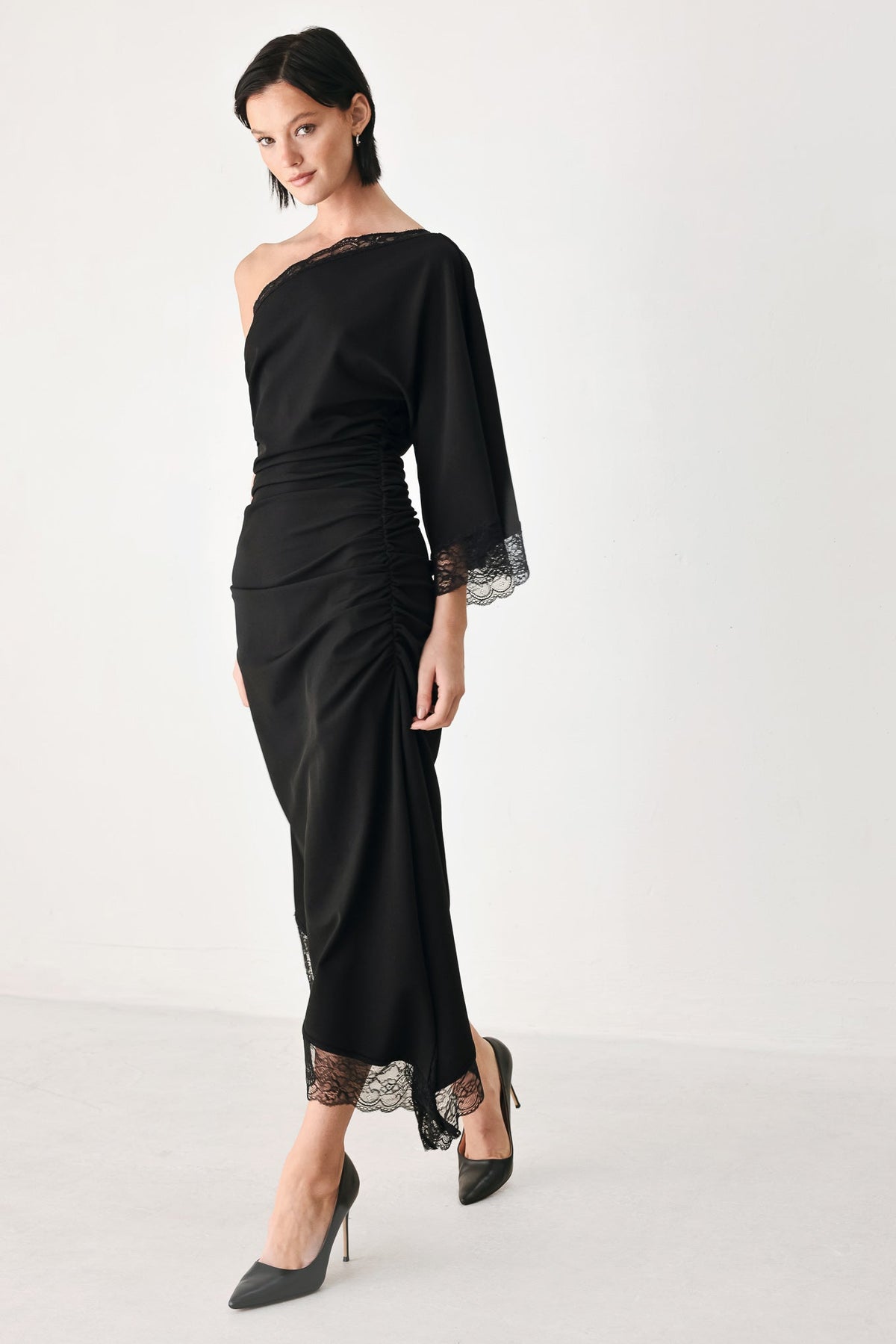 Black Knit Asymmetric Midi Dress with Ruched Bodice and Lace-Trim Hem