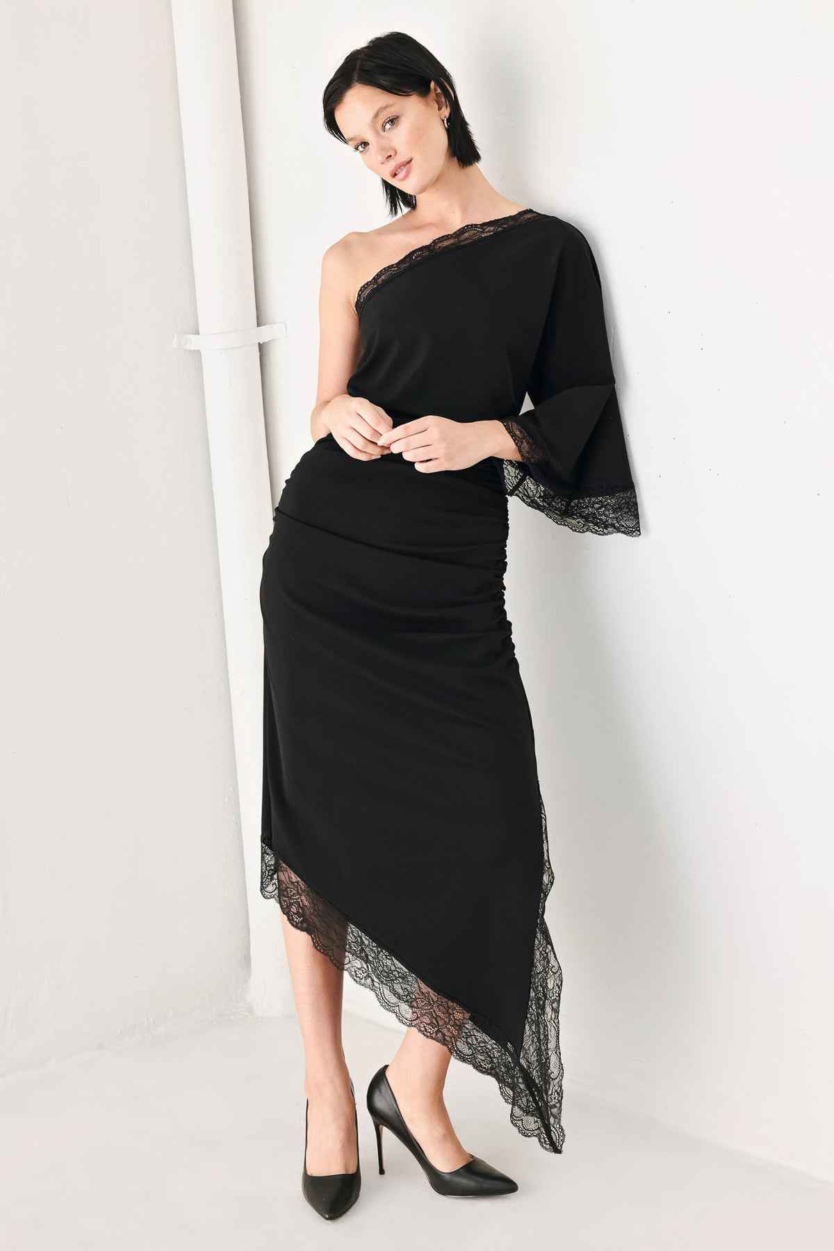 Black Knit Asymmetric Midi Dress with Ruched Bodice and Lace-Trim Hem BLACK