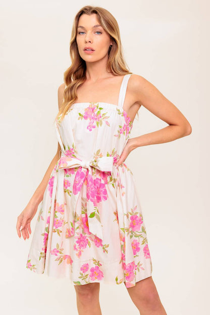 Pink Floral Spring Cotton Mini Dress with Bow Tie and Pockets | Trendy Mini Dresses Outfit Idea for Women by Ro + Ivy | Elevated Basics, Modern Comfort & Style