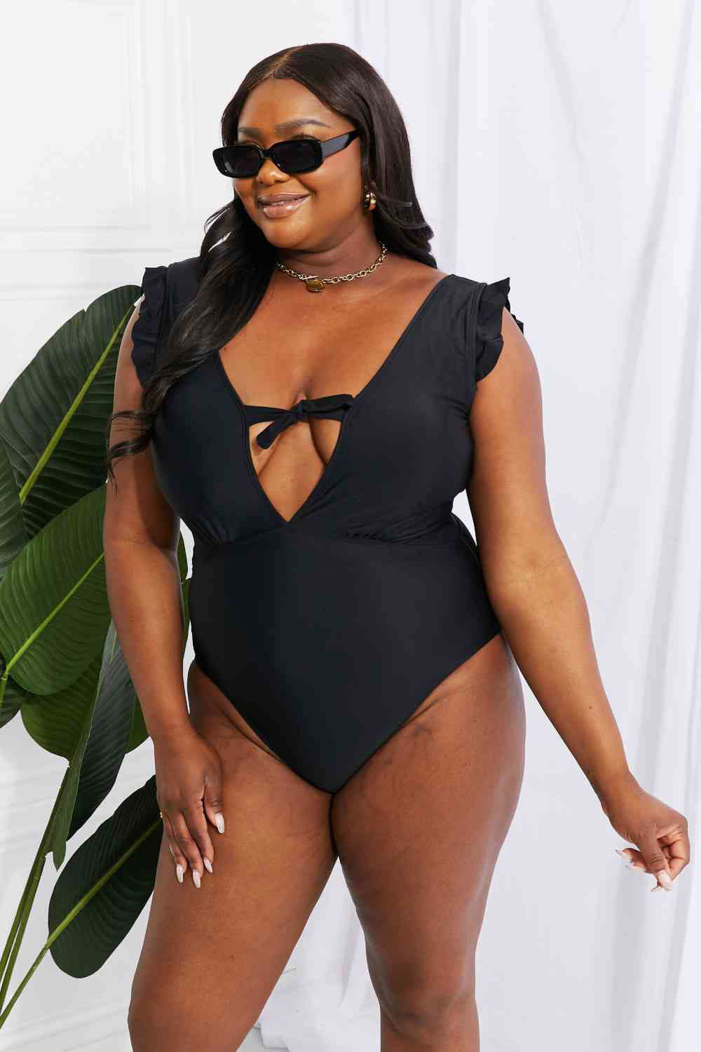 Swim Seashell Ruffle Sleeve One-Piece in Black for Women - Ro + Ivy