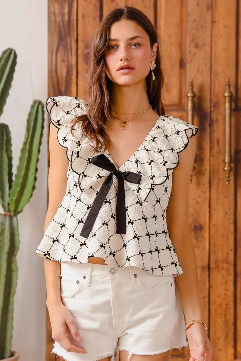 Textured V Neck Bow Tie Short Sleeve Scallop Blouse | Trendy Blouses Outfit Idea for Women by Ro + Ivy | Elevated Basics, Modern Comfort & Style