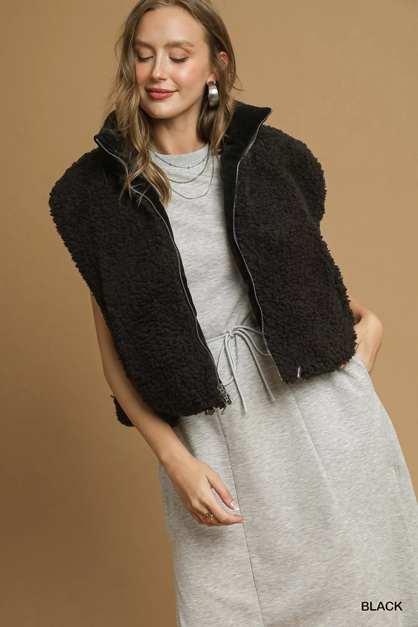 Black Drawstring Hem Sherpa-Lined Zip Up Vest in Black | Trendy Vests Outfit Idea for Women by Ro + Ivy | Elevated Basics, Modern Comfort & Style