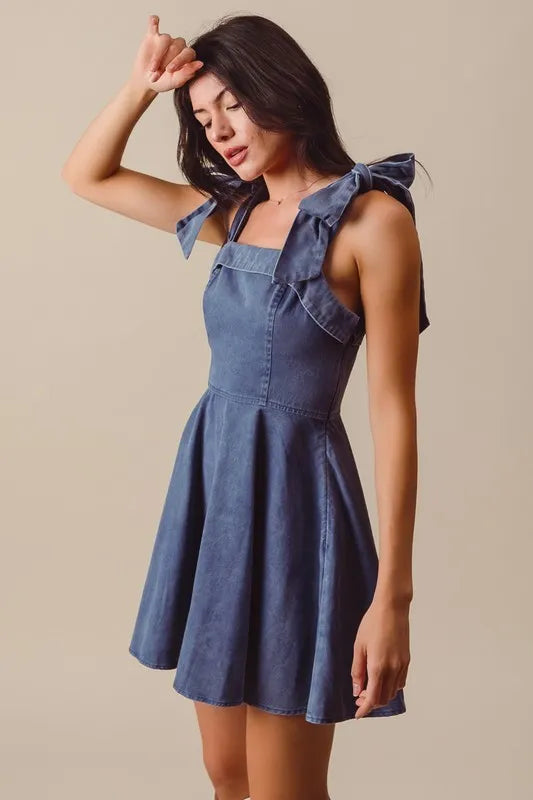 Denim Washed Fit and Flare Mini Dress with Bow Straps and Square Neck – outfit idea for women | Ro + Ivy